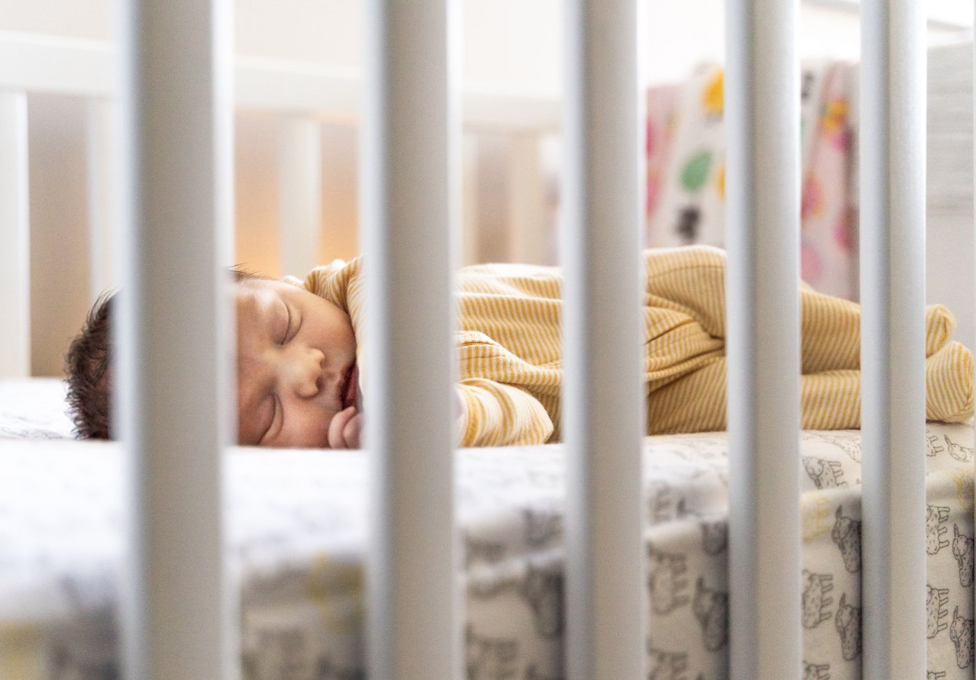 Baby inside the cot, side camera